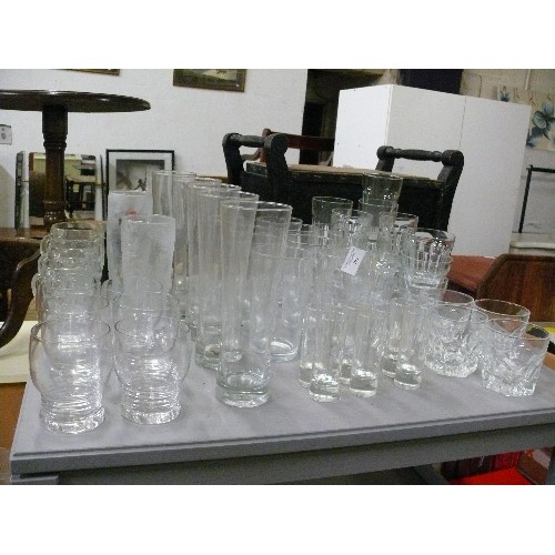 292 - MIXED GLASS - PINT GLASSES, TUMBLERS, SHOT GLASSES AND TNKARDS.