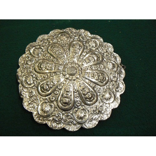 264 - VINTAGE TURKISH SILVER WEDDING MIRROR WITH REPOUSSE DECORATION OF FLOWERS AND SHELLS - DIA 18CM.