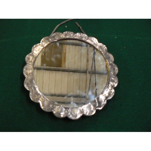 264 - VINTAGE TURKISH SILVER WEDDING MIRROR WITH REPOUSSE DECORATION OF FLOWERS AND SHELLS - DIA 18CM.