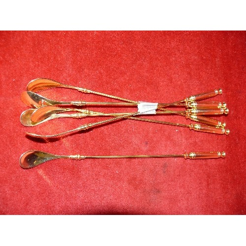 73 - SET OF SIX LONG HANDLED GOLF THEMED SPOONS MARKED 24K GP.