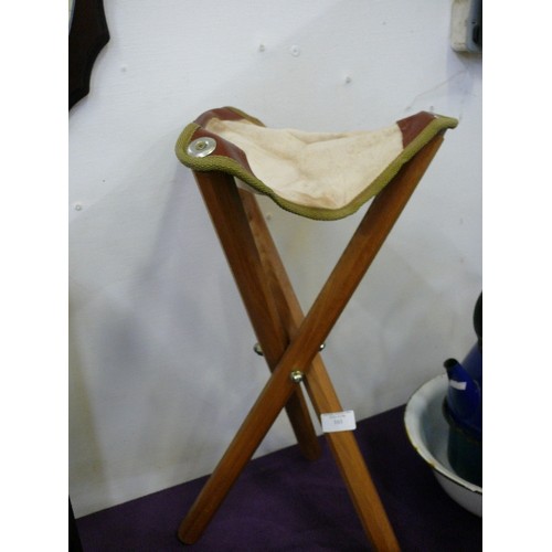 103 - WOODEN TRIPOD STOOL WITH CANVAS SEAT.