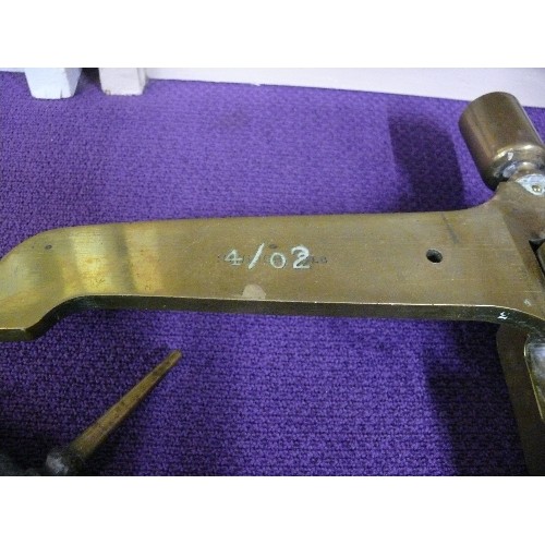 68 - VARIOUS BRASS AND CAST IRON SCALE PARTS INCLUDING ONE MARKED WITH THE MILITARY BROAD ARROW.