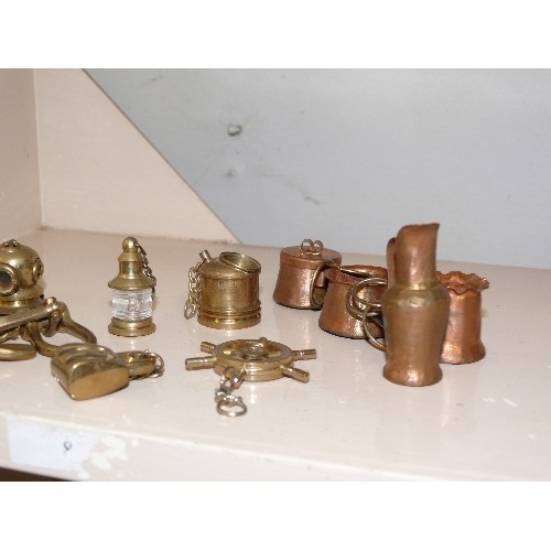 75 - COLLECTION OF VARIOUS MINATURE COPPER AND BRASS ITEMS INCLUDING A DIVERS HELMET, SHIPS WHEEL, LANTER... 