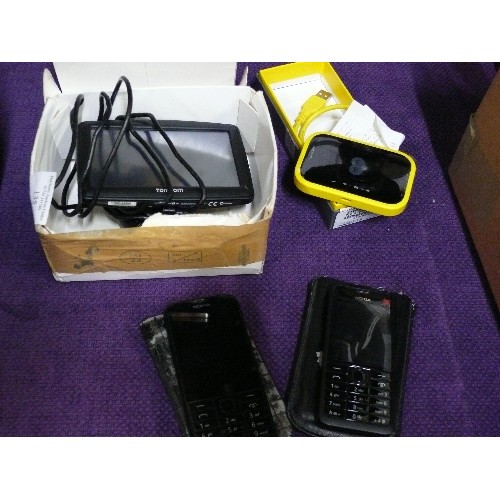 135 - XXL TOMTOM WITH ORIGINAL BOX PLUS AN EE MINI WIFI BOX AND TWO NOKIA MOBILE PHONES.