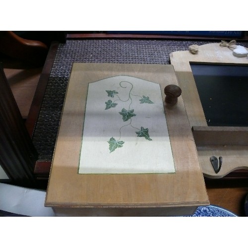 221 - A WOODEN KEY CUPBOARD WITH IVY LEAF DECORATION, A WOODEN FRAMED BLACKBOARD WITH HOOKS AND A WOODEN F... 