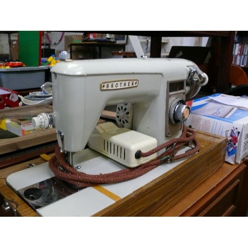 231 - VINTAGE SEWING MACHINE BY BROTHER