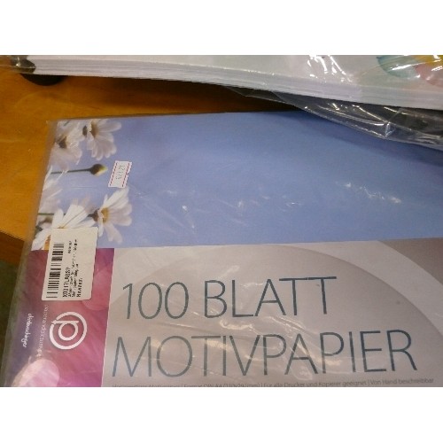 265 - TWO NEW PACKS, EACH CONTAINING 100 SHEETS OF BLATT MOTIVPAPER WITH BALLOONS AND FLOWER PATTERNS.