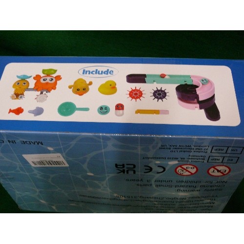 281 - KIDS BATH TOY SUIT, NEW AND BOXED.