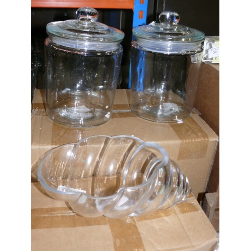 292 - TWO LARGE GLASS STORAGE JARS AND A GLASS SHELL VASE, ALL NEW AND BOXED.