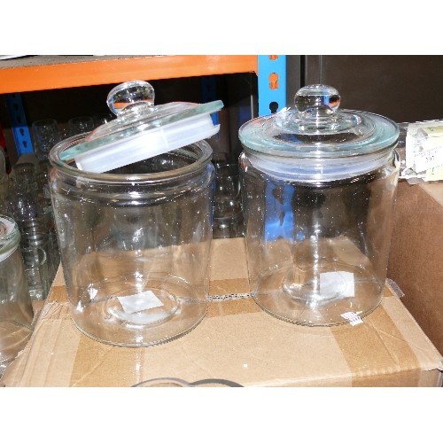 292 - TWO LARGE GLASS STORAGE JARS AND A GLASS SHELL VASE, ALL NEW AND BOXED.