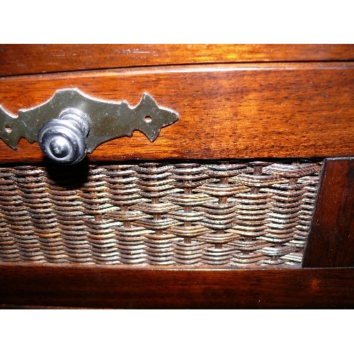 366 - CHEST OF DRAWERS 2/4 IN DARK WOOD WITH RATTAN FRONTED DRAWER PANELS, WELL MADE.