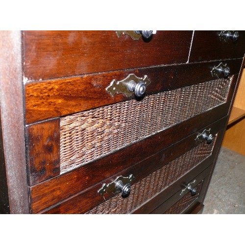 367 - CHEST OF DRAWERS 2/4 IN DARK WOOD WITH RATTAN FRONTED DRAWER PANELS, WELL MADE.