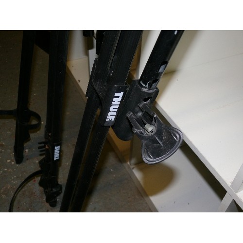 184A - THREE THULE CAR BIKE RACKS