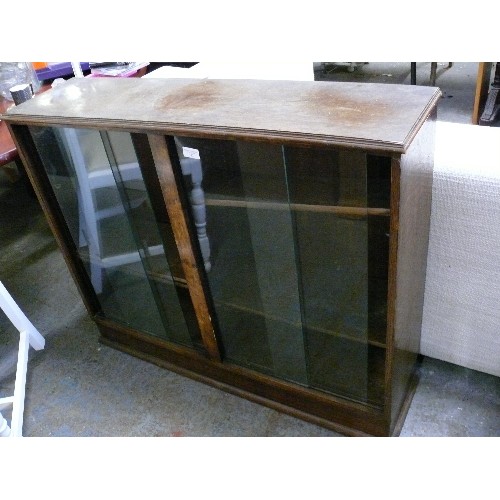 393 - OAK BOOKCASE WITH SLIDING GLASS DOORS