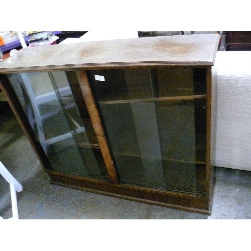 393 - OAK BOOKCASE WITH SLIDING GLASS DOORS