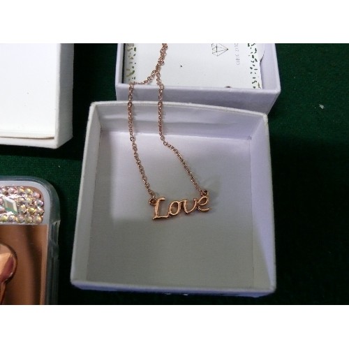 15 - ROSE GOLD METAL COSTUME JEWELLERY - TO INCLUDE A 'LOVE' NECKLACE AND MOBILE PHONE BACK COVER.