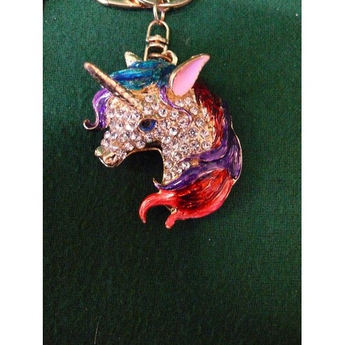 57 - FOUR KEYRINGS ENCRUSTED WITH BLING -  DOG, UNICORN, SEAHORSE AND AN ELEPHANT.