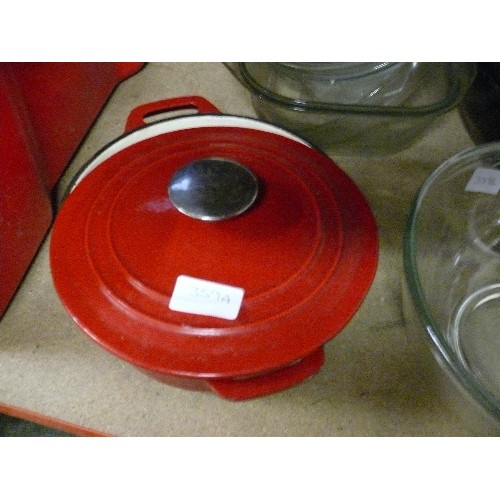 359A - RED CAST IRON CASSEROLE DISH AND LID.