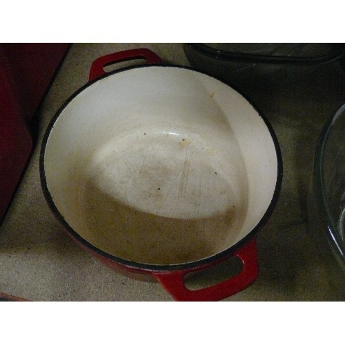 359A - RED CAST IRON CASSEROLE DISH AND LID.