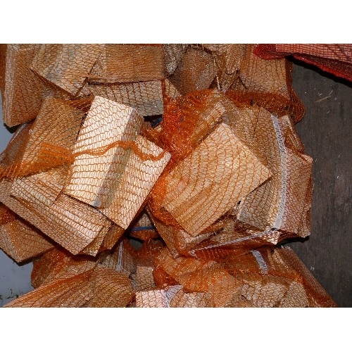 438 - THREE ORANGE DRY FIREWOOD OFFCUTS