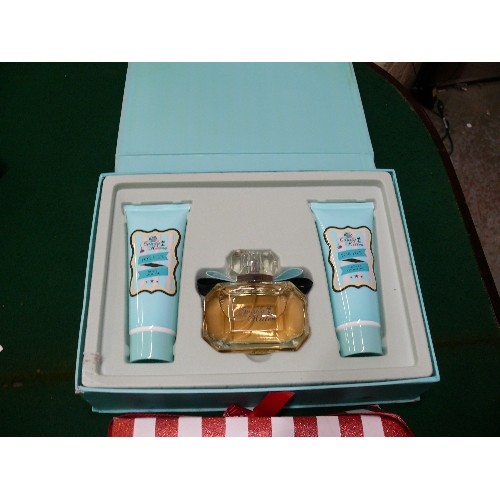 44 - CANDY KITTEN PERFUME GIFT SET AND BAYLISS AND HARDING SWEET TEMPTATION GIFT SET.