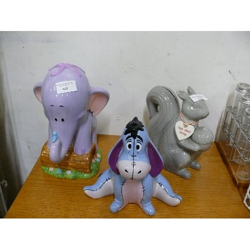 440 - TWO DISNEY MONEYBOXES - DUMBO AND EEYORE, PLUS A SQUIRREL 'NUTS ABOUT MONEY' MONEYBOX.