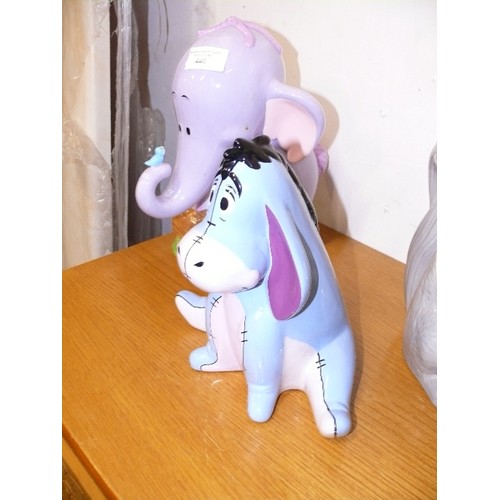 440 - TWO DISNEY MONEYBOXES - DUMBO AND EEYORE, PLUS A SQUIRREL 'NUTS ABOUT MONEY' MONEYBOX.