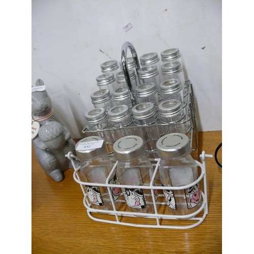 442 - SIXTEEN SPICE JARS IN A CHROME AND WOOD STAND PLUS THREE RINGTON PLASTIC BOTTLES IN STAND.