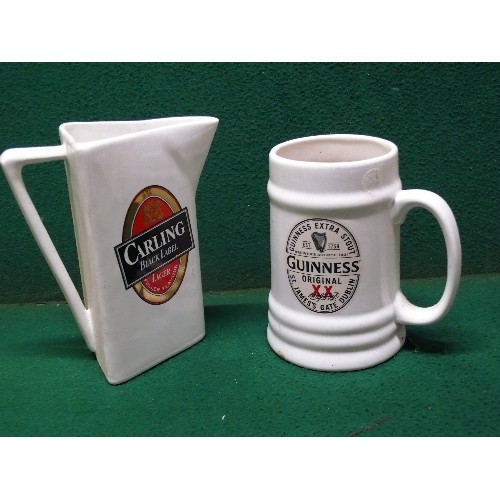 86 - A CARLING BLACK LABEL ADVERTISING WATER JUG PLUS A GUINNESS TANKARD.