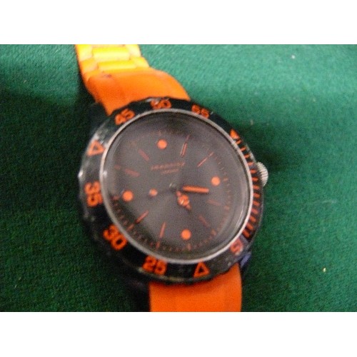 60 - IDENTITY LONDON WATCH IN ORANGE AND AN ORANGE CITRON WATCH.