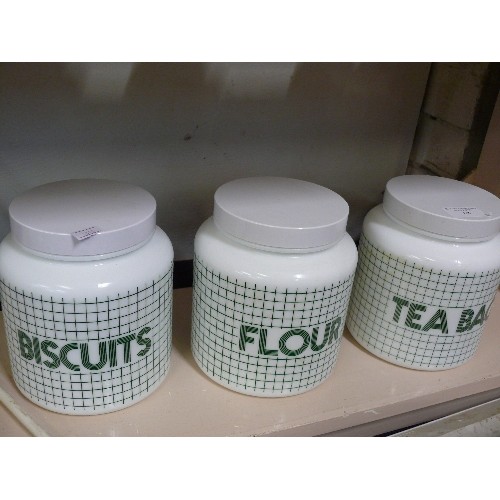 68 - LARGE WHITE AND GREEN GLASS STORAGE JARS WITH SCREW LIDS FOR BISCUITS, FLOUR AND TEA BAGS.