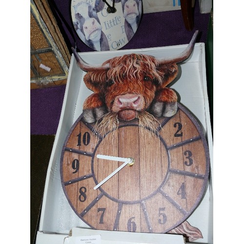 106 - TWO CATTLE THEMED CLOCKS, ONE WITH ITS BOX.