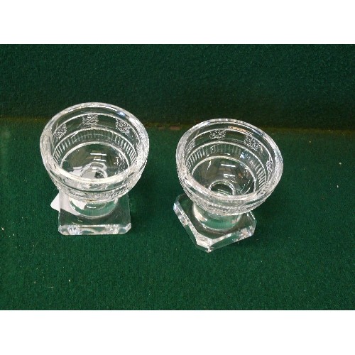 23 - A PAIR OF CRYSTAL GLASS SALTS