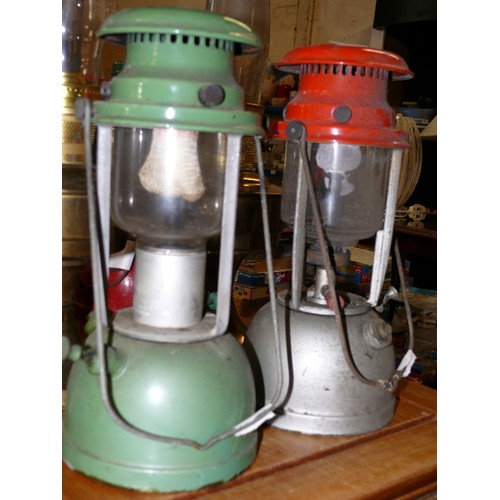 220 - TWO TILLEY LAMPS, ONE RED TOP AND ONE GREEN TOP.