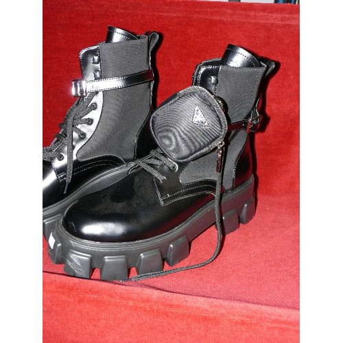 199 - LADIES PAIR OF BOOTS MARKED 'PRADA' SIZE 45.