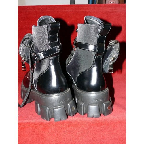 199 - LADIES PAIR OF BOOTS MARKED 'PRADA' SIZE 45.