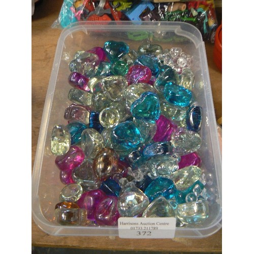 372 - BOX OF COLOURED GLASS HEARTS AND STONES.