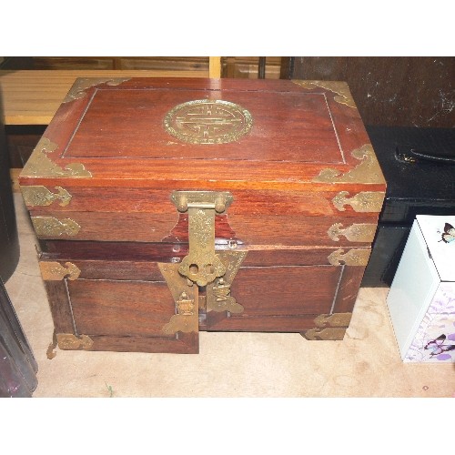 380 - LARGE HARDWOOD CHINESE JEWELLERY BOX,  EXTERIOR DOORS REVEALING THREE DRAWERS, LINED IN RED (ONE DOO... 