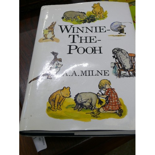 312 - A CHILDRENS HARDBACK BOOK 'WINNIE THE POOH' PLUS VINTAGE ENID BLYTON CHILDRENS HARDBACK BOOKS.