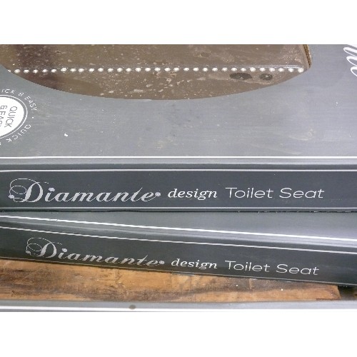 440 - TWO BOXED DIAMANTE TOILET SEATS ONE BLACK, ONE WHITE.