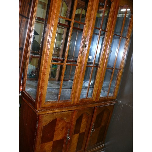 481 - TRADITIONAL LARGE DISPLAY CABINET WITH ARCHED DOORS AND CUPBOARDS (A DOOR HAS GLASS PANELS MISSING).