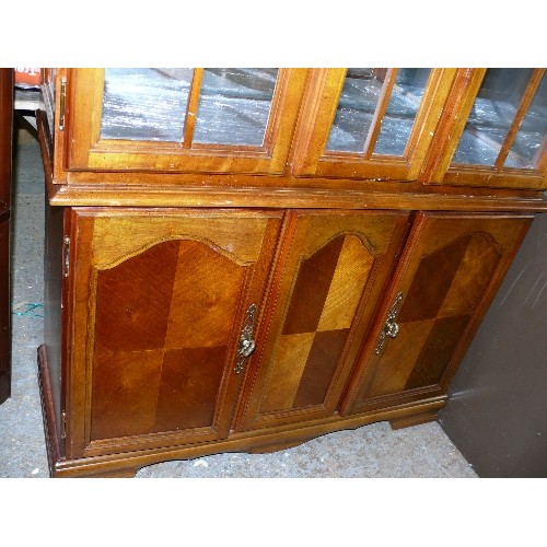 481 - TRADITIONAL LARGE DISPLAY CABINET WITH ARCHED DOORS AND CUPBOARDS (A DOOR HAS GLASS PANELS MISSING).