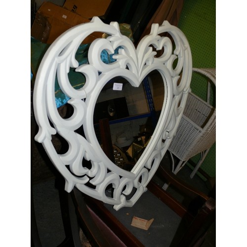 485 - LARGE LOVEHEART MIRROR WITH A CREAM PATTERNED BORDER.