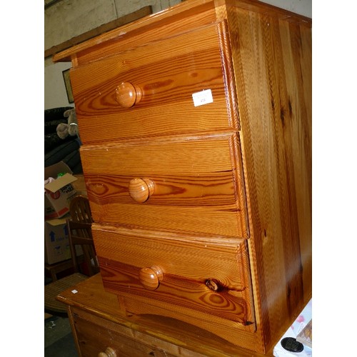 498 - PINE THREE DRAWER BEDSIDE CHEST.