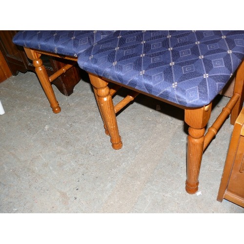 510 - TWO SOLID PINE DINING CHAIRS WITH BLUE UPHOLSTERY.