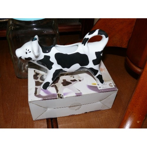 270 - SOLDIER AND VESPA EGG CUPS, NEW IN BOX, A COW SHAPED MILK JUG WITH BOX AND A LARGE GLASS STORAGE JAR... 