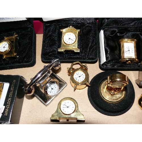 63 - ELEVEN MINIATURE CLOCKS.