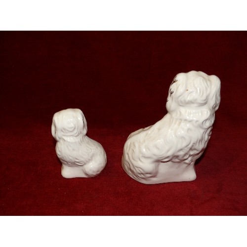 72 - TWO ROYAL DOULTON CHINA SPANIEL DOGS - ONE LARGER THAN THE OTHER.