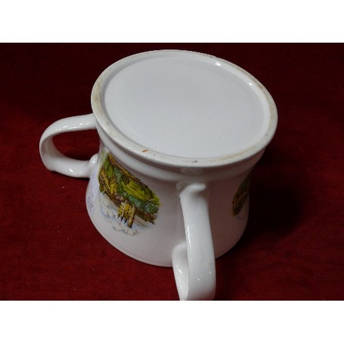 86 - LARGE THREE HANDLED MUG DECORATED WITH PICTURES OF BALMORAL CASTLE.