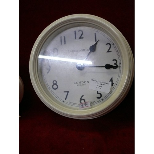 125 - A LAURA ASHLEY METAL WALL CLOCK PLUS A LAURA ASHLEY ALARM CLOCK AND A FURTHER ALARM CLOCK BY NEWGATE... 